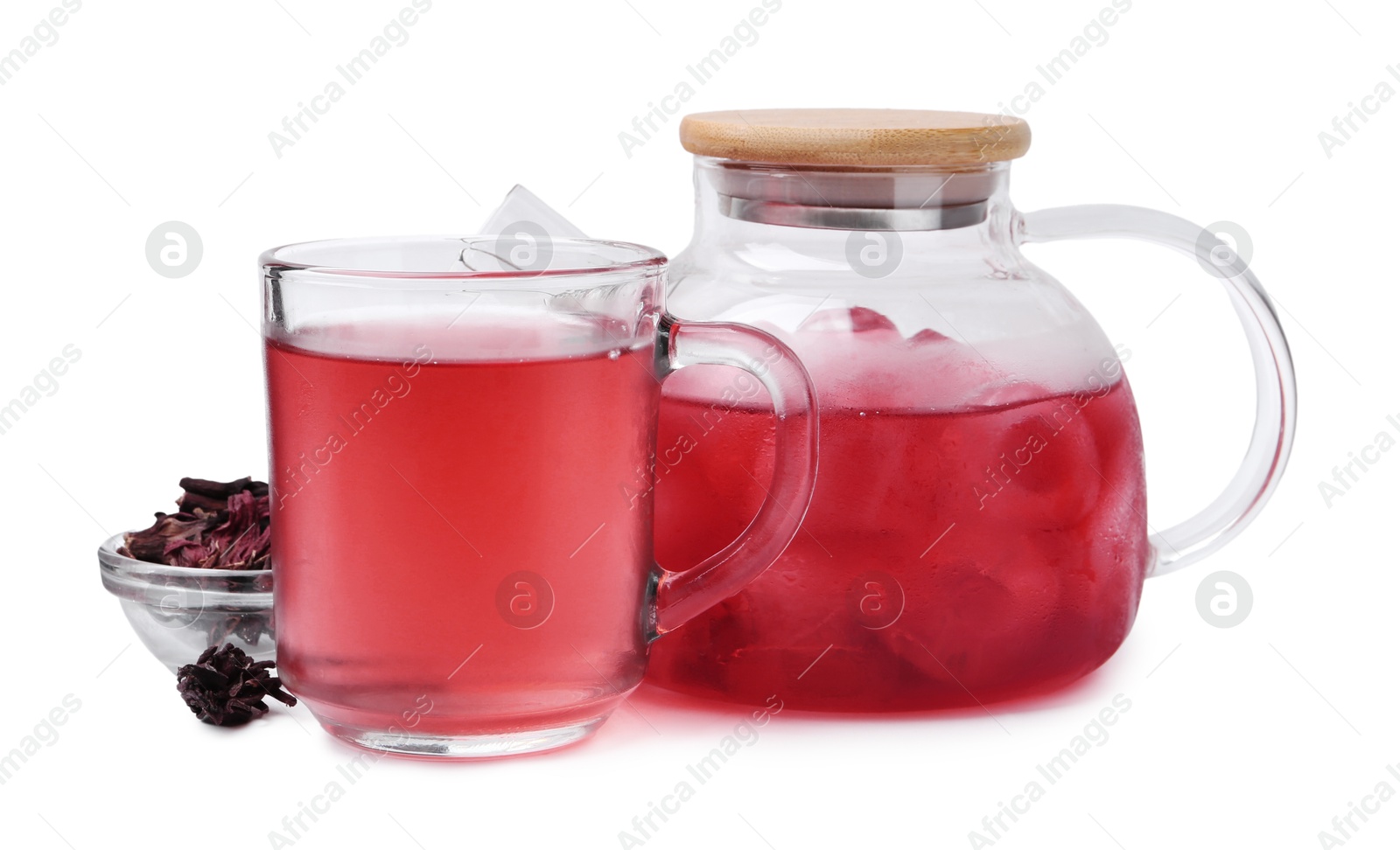 Photo of Delicious hibiscus tea with ice and dry roselle sepals isolated on white