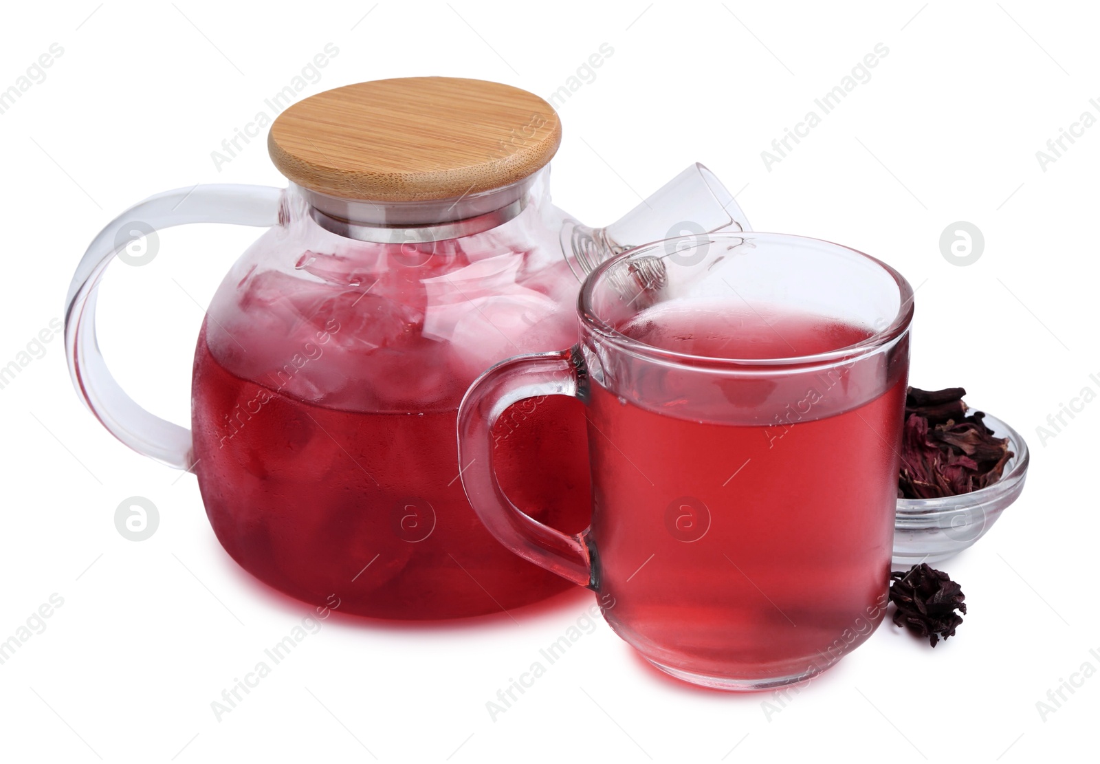 Photo of Delicious hibiscus tea with ice and dry roselle sepals isolated on white