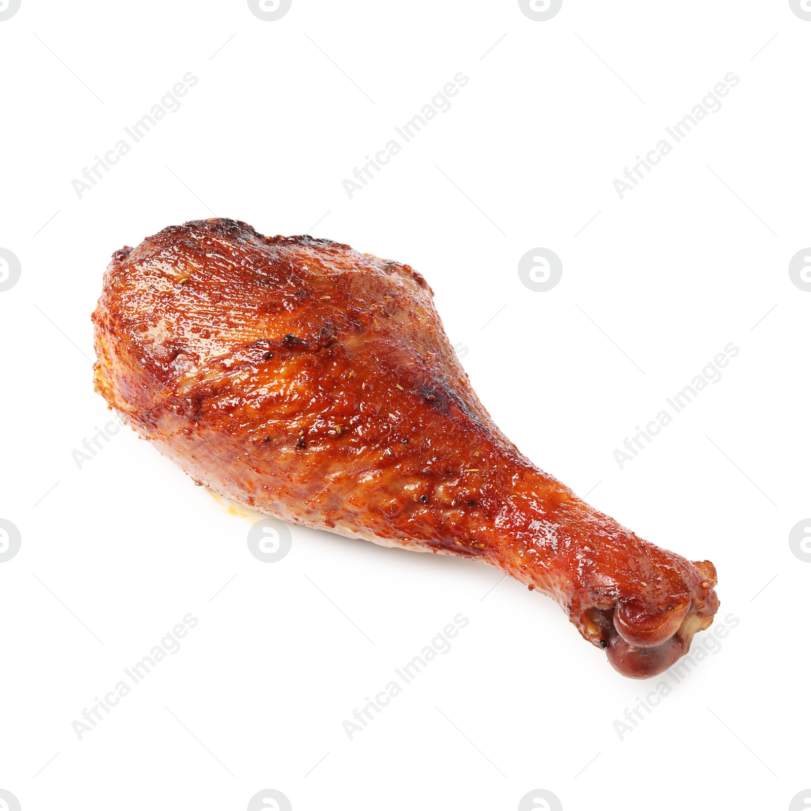 Photo of Delicious baked turkey drumstick isolated on white