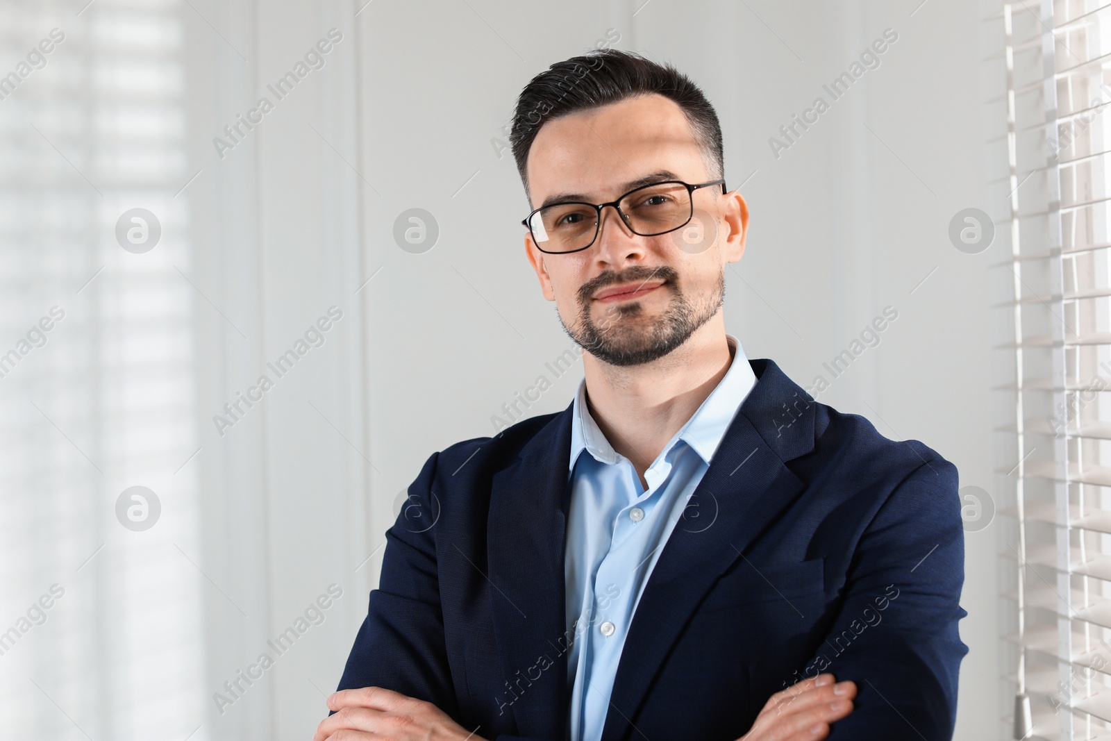 Photo of Portrait of handsome middle aged man indoors