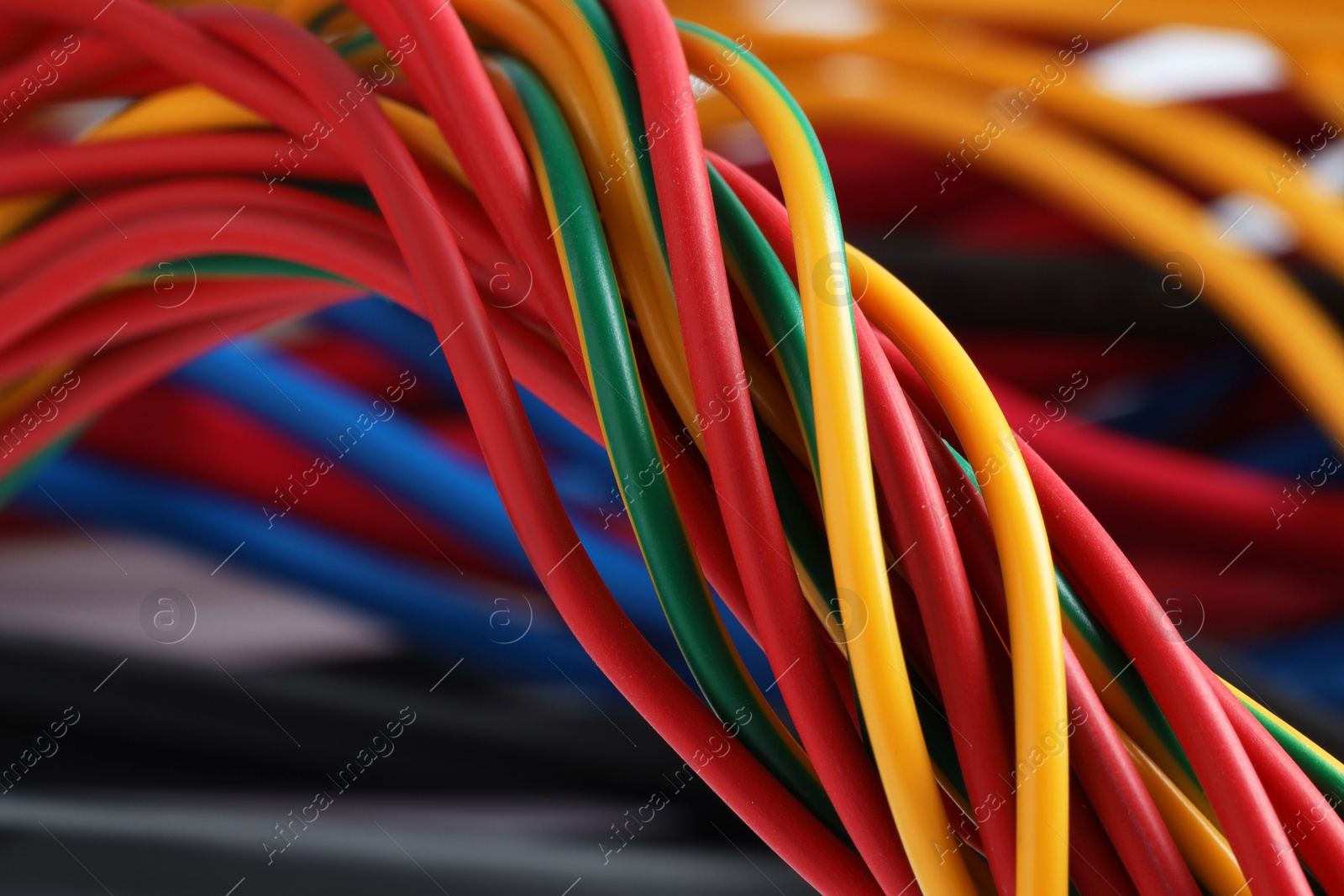 Photo of Many colorful electrical wires as background, closeup