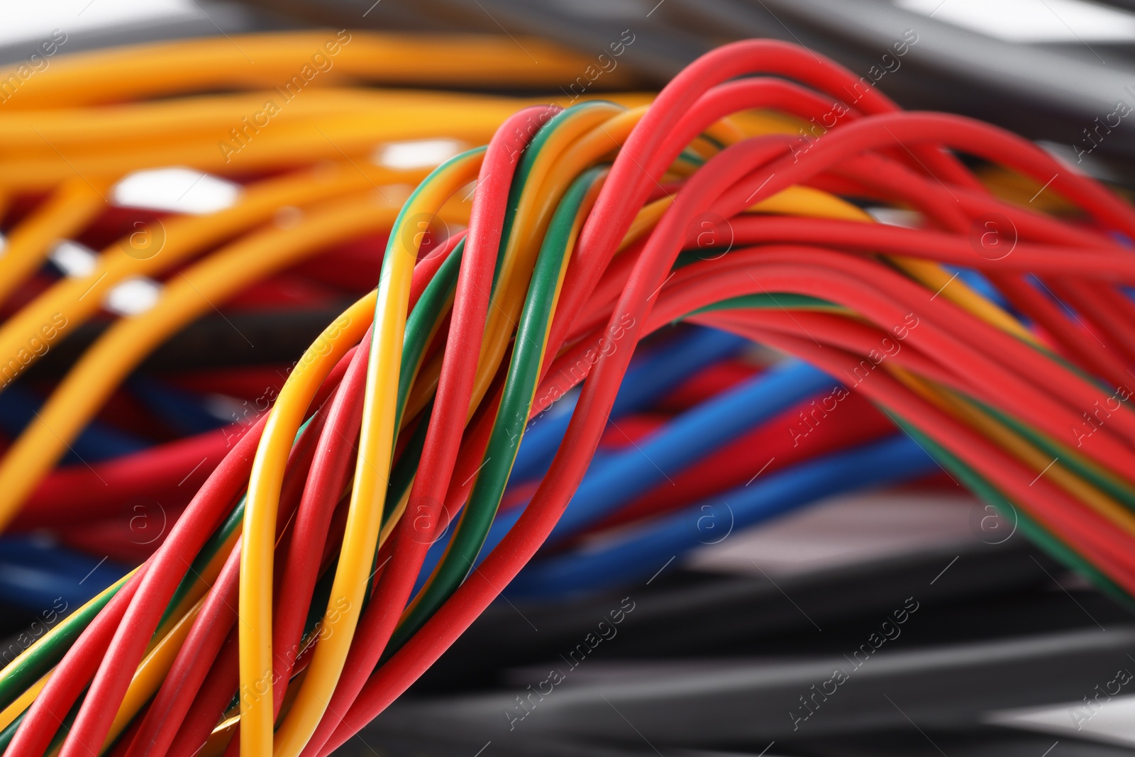 Photo of Many colorful electrical wires as background, closeup