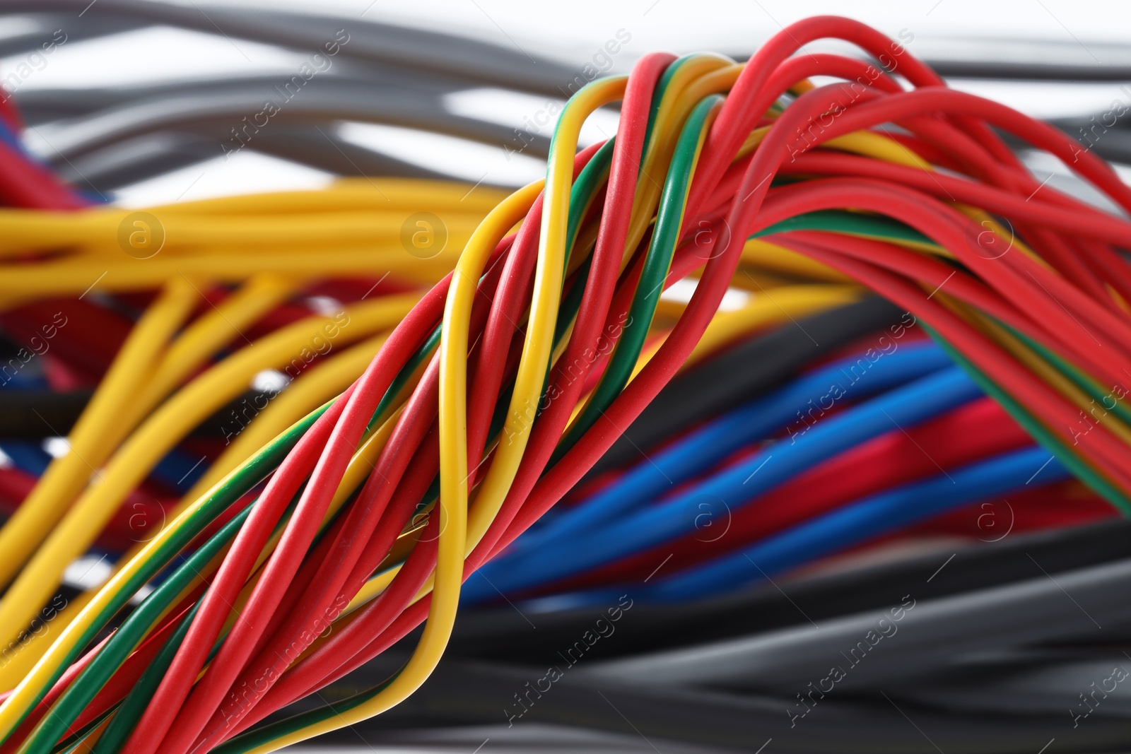 Photo of Many colorful electrical wires as background, closeup