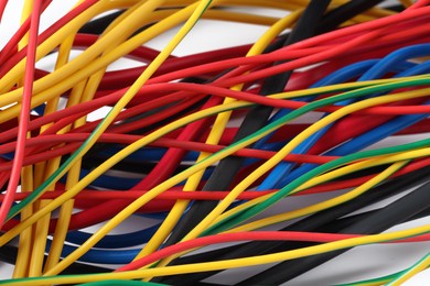 Photo of Many colorful electrical wires as background, closeup