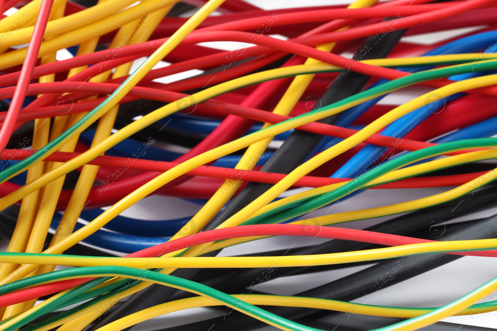 Photo of Many colorful electrical wires as background, closeup