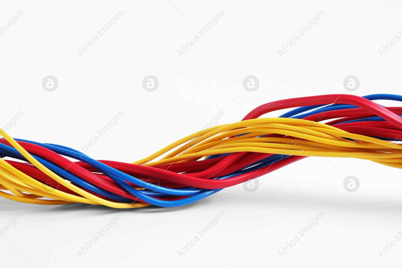 Photo of Many colorful electrical wires isolated on white