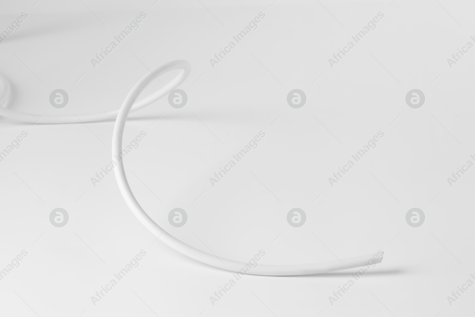 Photo of One insulated electrical wire isolated on white