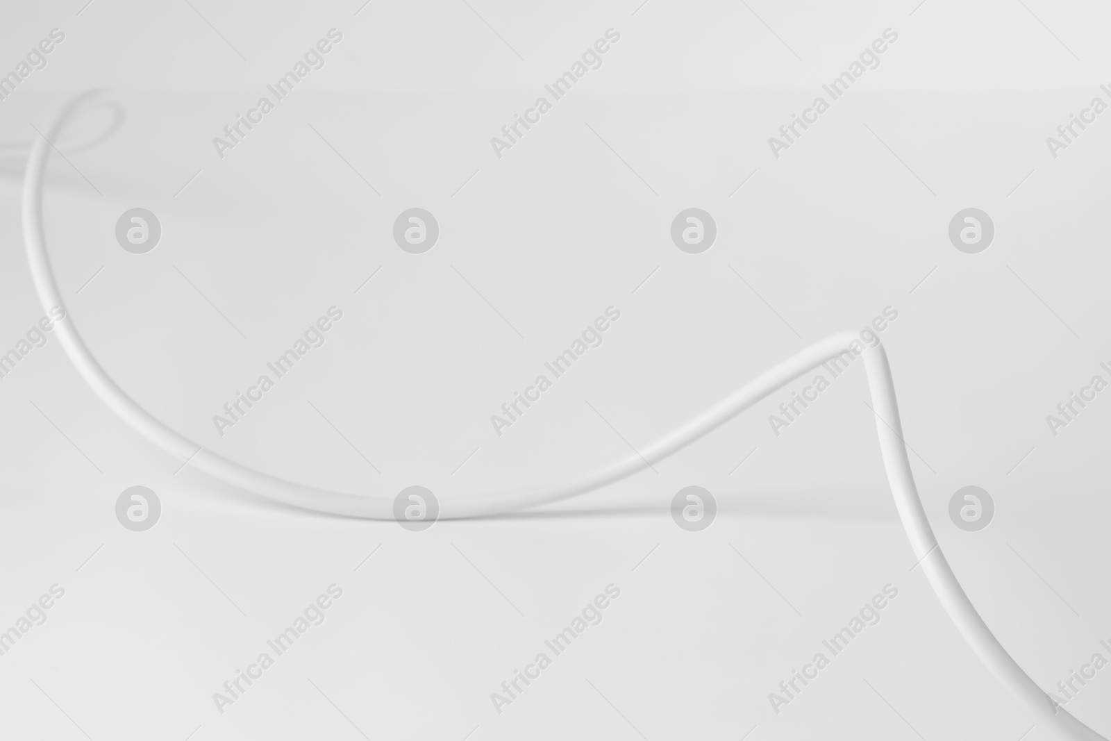 Photo of One insulated electrical wire isolated on white