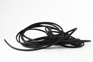 Photo of Insulated black electrical wire isolated on white