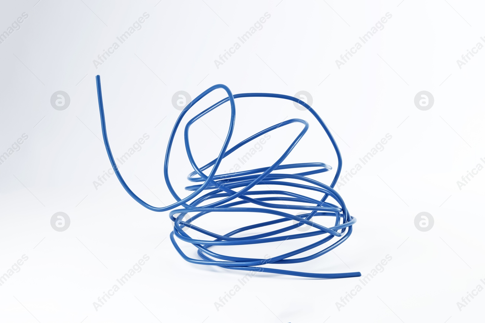 Photo of Insulated blue electrical wire isolated on white