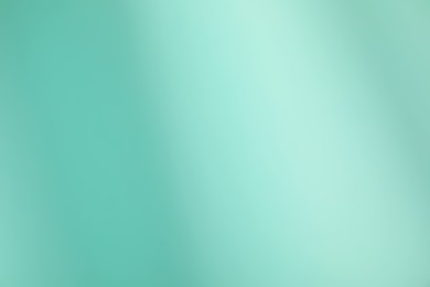 Photo of Turquoise gradient background. Abstract color backdrop for design