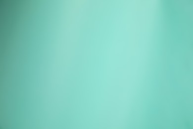 Photo of Turquoise gradient background. Abstract color backdrop for design