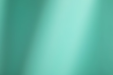 Photo of Turquoise gradient background. Abstract color backdrop for design