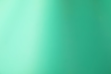 Photo of Turquoise gradient background. Abstract color backdrop for design