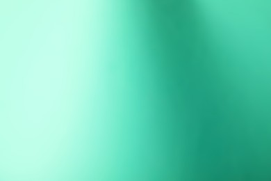 Photo of Turquoise gradient background. Abstract color backdrop for design