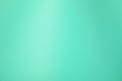 Photo of Turquoise gradient background. Abstract color backdrop for design