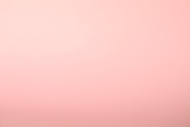 Photo of Light pink gradient background. Abstract color backdrop for design