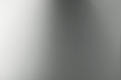 Photo of Light grey gradient background. Abstract color backdrop for design