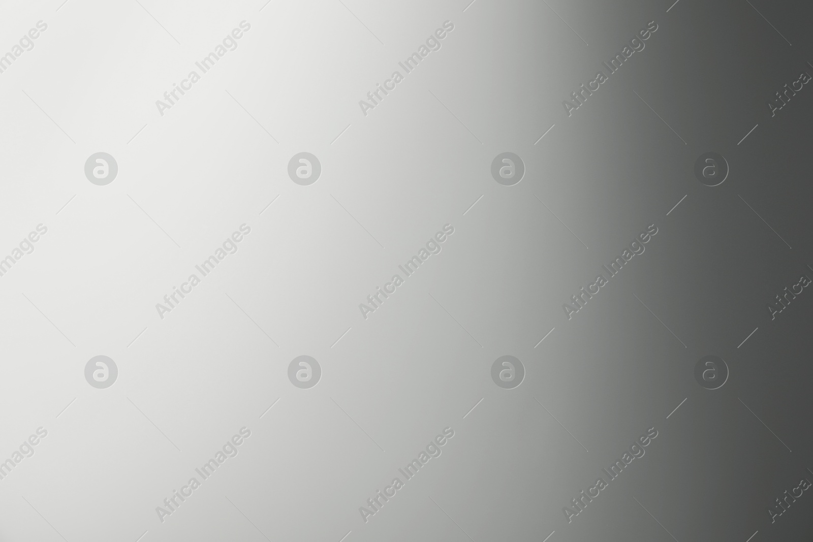 Photo of Light grey gradient background. Abstract color backdrop for design