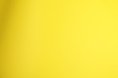 Photo of Yellow gradient background. Abstract color backdrop for design