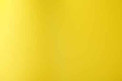 Photo of Yellow gradient background. Abstract color backdrop for design