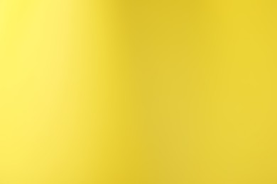 Photo of Yellow gradient background. Abstract color backdrop for design