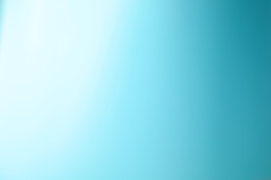 Photo of Light blue gradient background. Abstract color backdrop for design