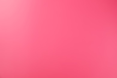 Photo of Bright pink gradient background. Abstract color backdrop for design