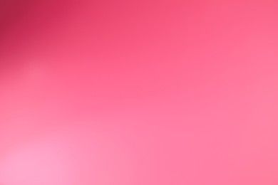 Photo of Bright pink gradient background. Abstract color backdrop for design