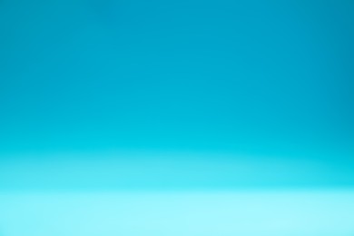 Photo of Light blue gradient background. Abstract color backdrop for design