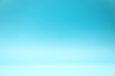 Photo of Light blue gradient background. Abstract color backdrop for design