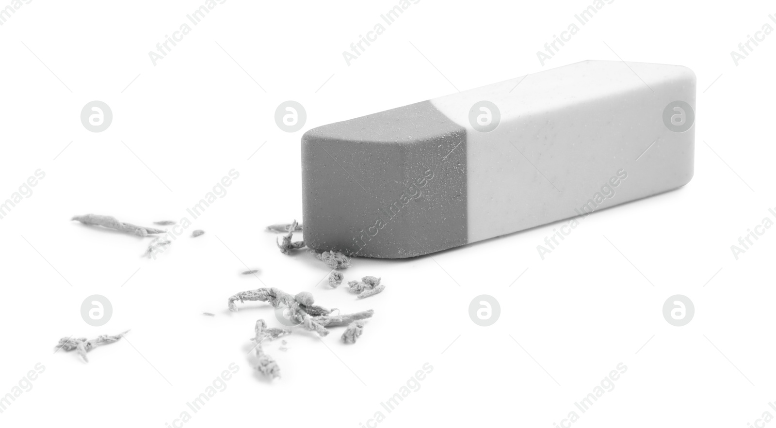 Photo of One eraser and scraps isolated on white