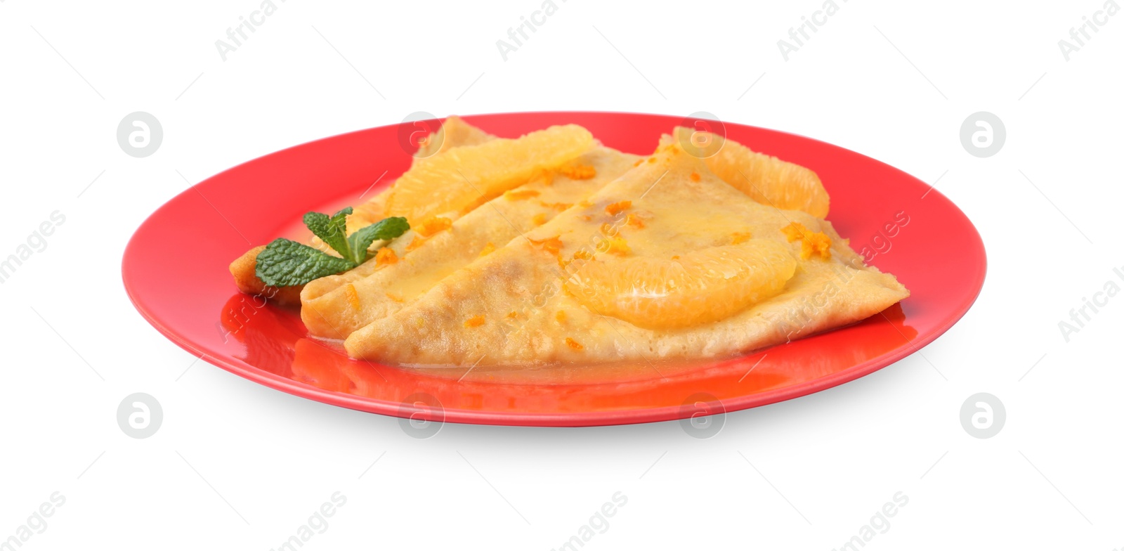 Photo of Plate with tasty crepes Suzette isolated on white