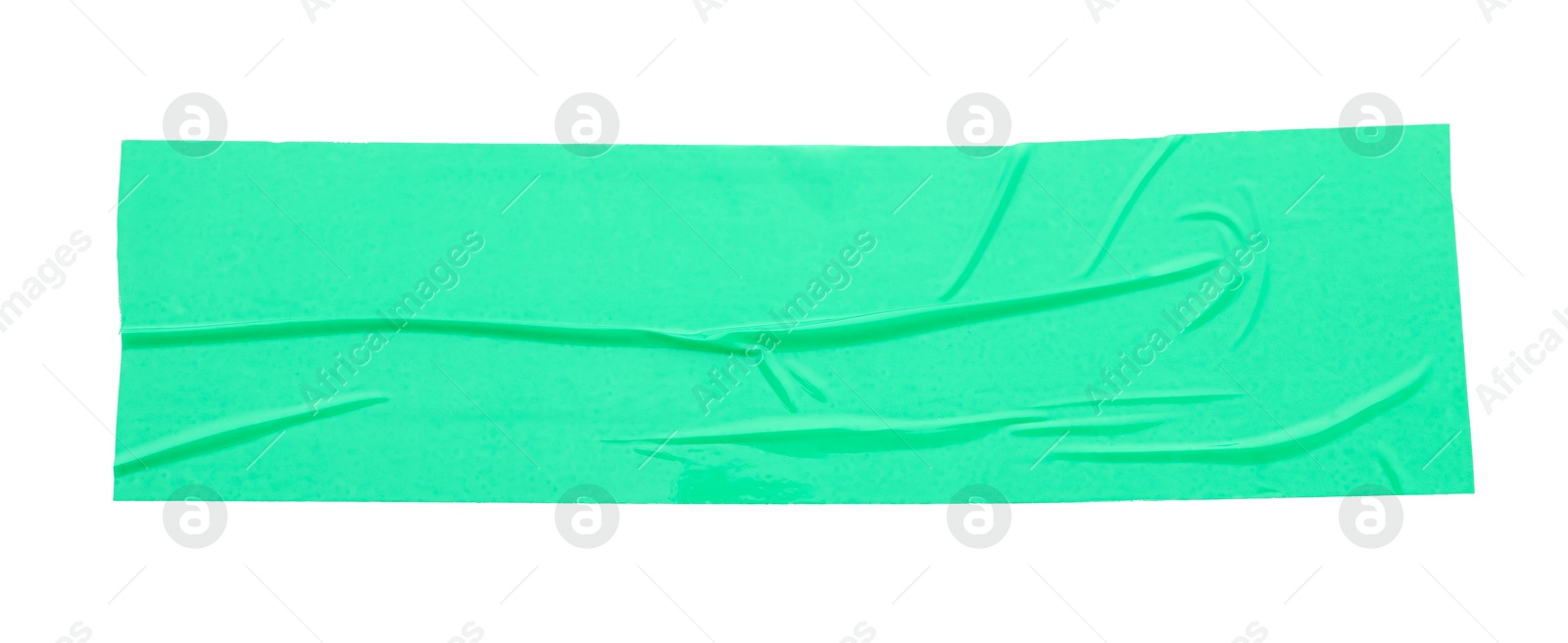 Photo of Strip of green adhesive tape isolated on white, top view