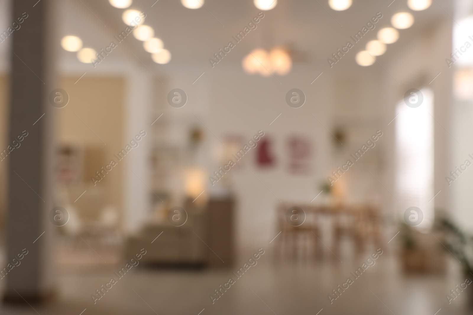 Photo of Blurred view of cozy living room. Interior design