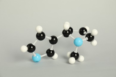 Photo of Chemical model of molecule on light grey background