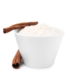 Photo of Tasty rice pudding with cinnamon isolated on white