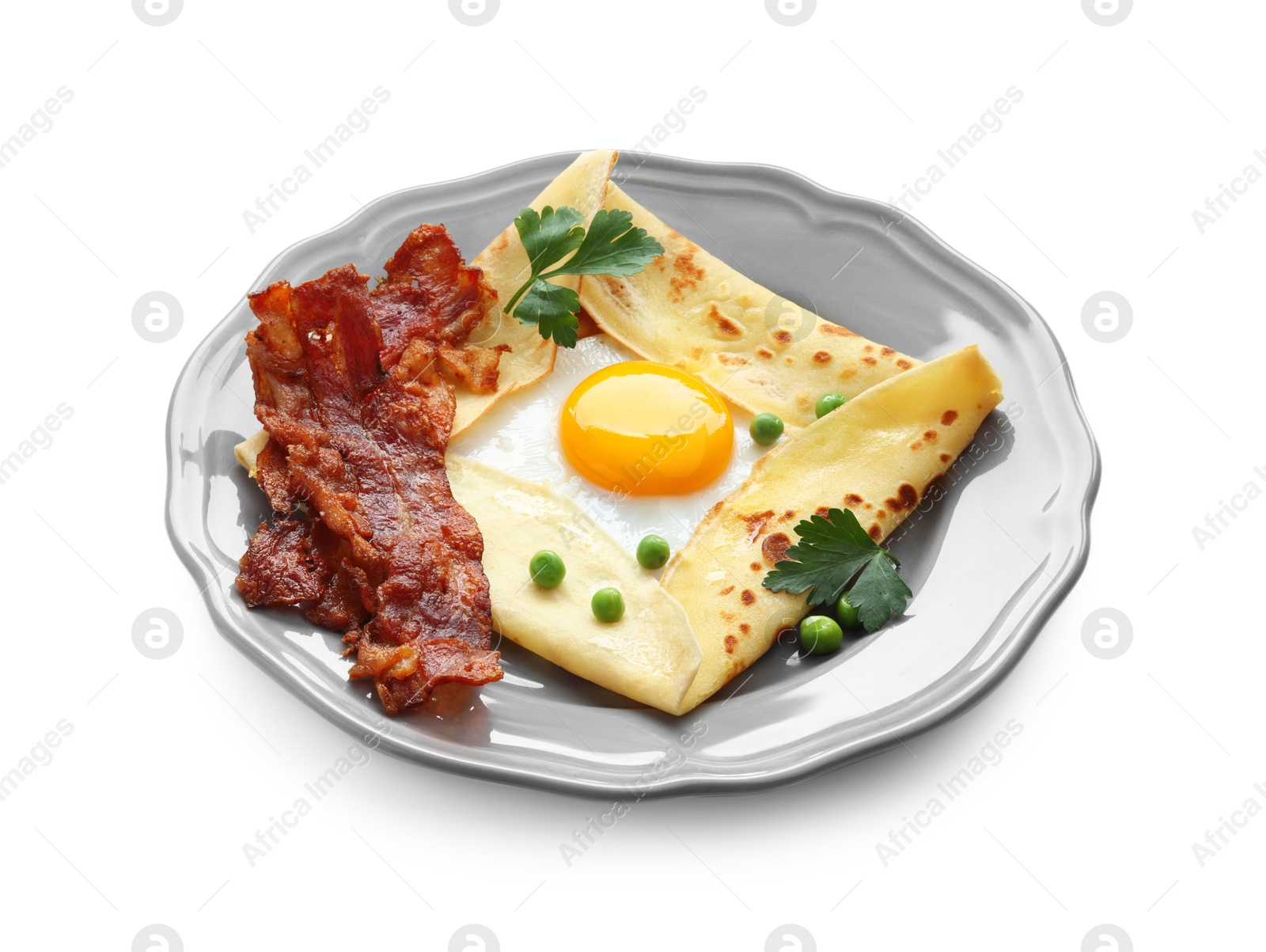 Photo of Delicious crepe with egg, bacon and green peas isolated on white. Breton galette