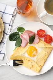 Photo of Delicious crepe with egg, ham and parmesan cheese served on white wooden table, flat lay