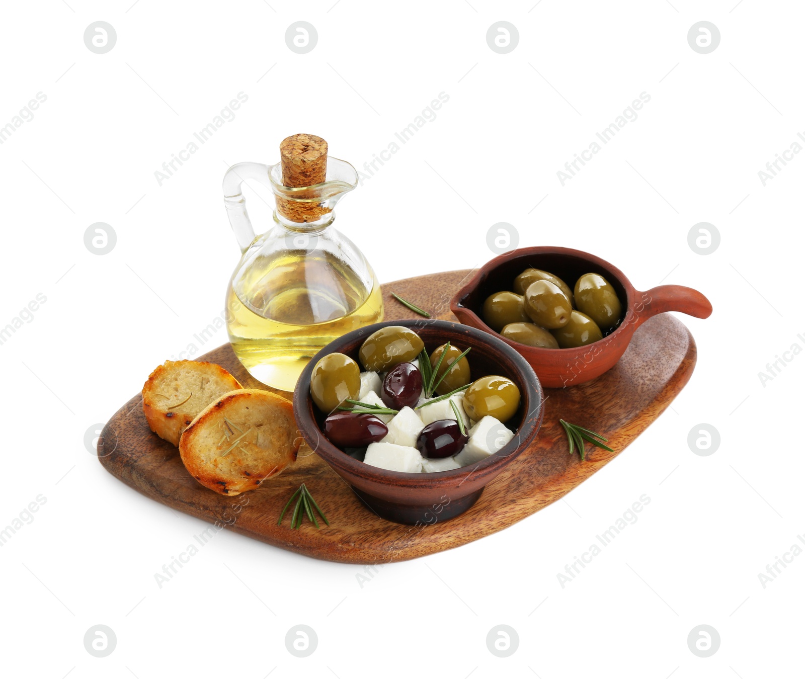 Photo of Marinated olives, feta cheese, bread pieces and oil isolated on white