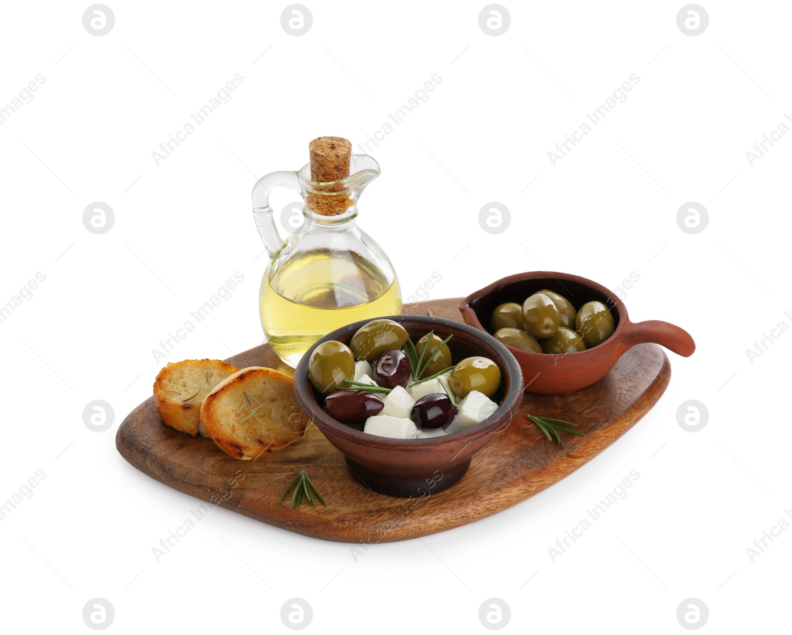 Photo of Marinated olives, feta cheese, bread pieces and oil isolated on white