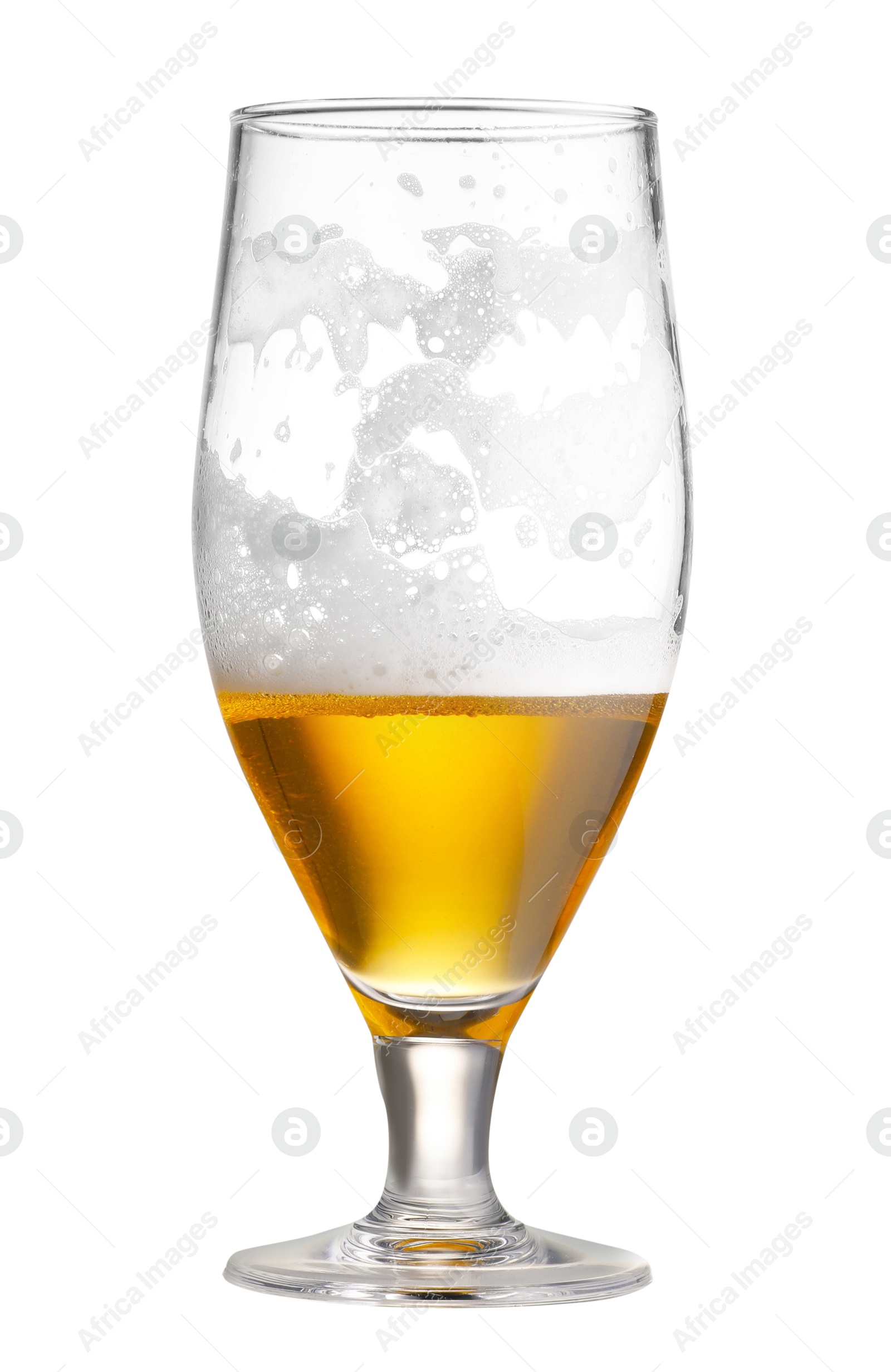 Photo of Almost empty glass of beer isolated on white