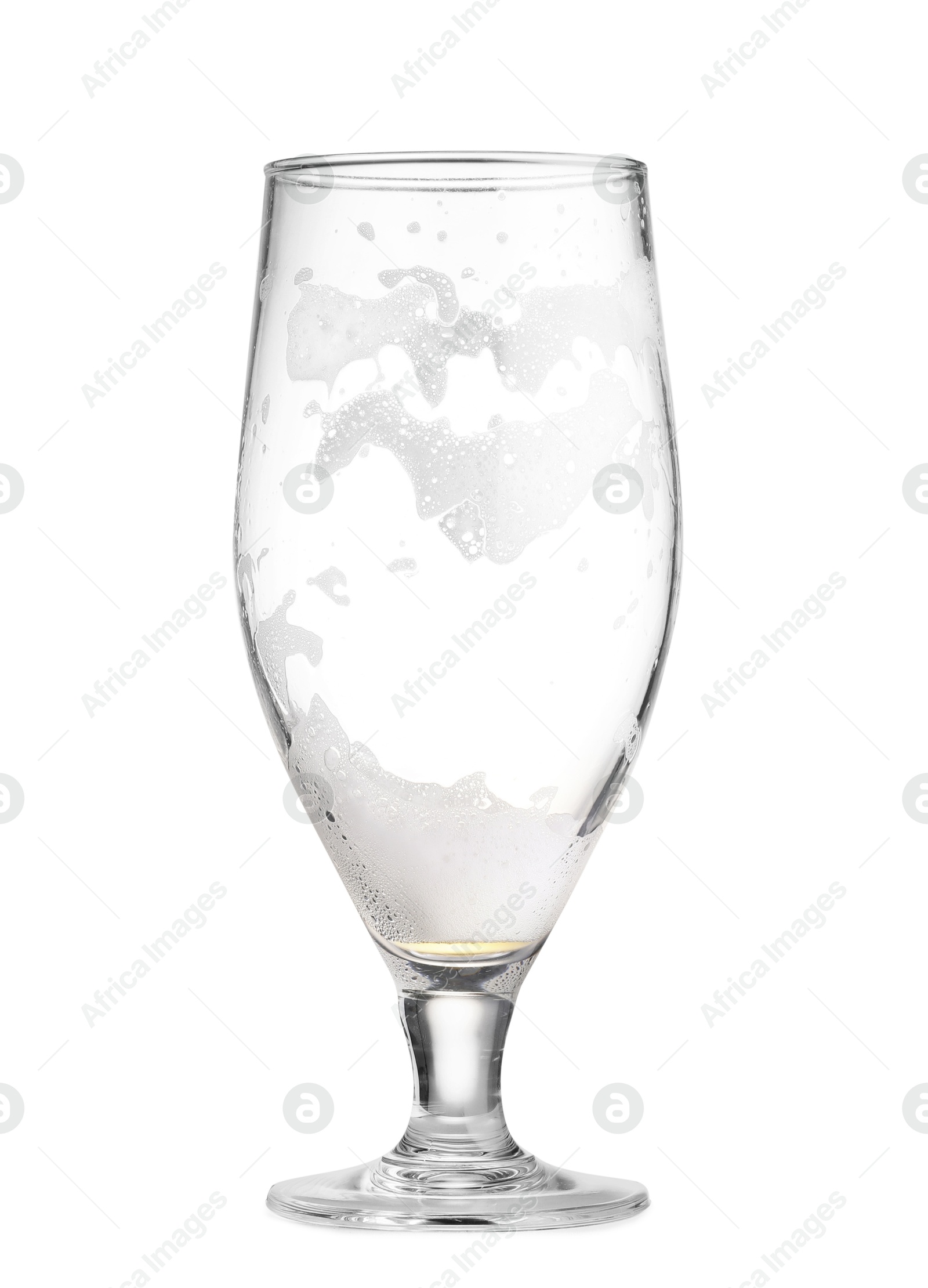 Photo of Beer glass with foam isolated on white