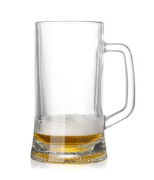 Photo of Almost empty glass mug of beer isolated on white