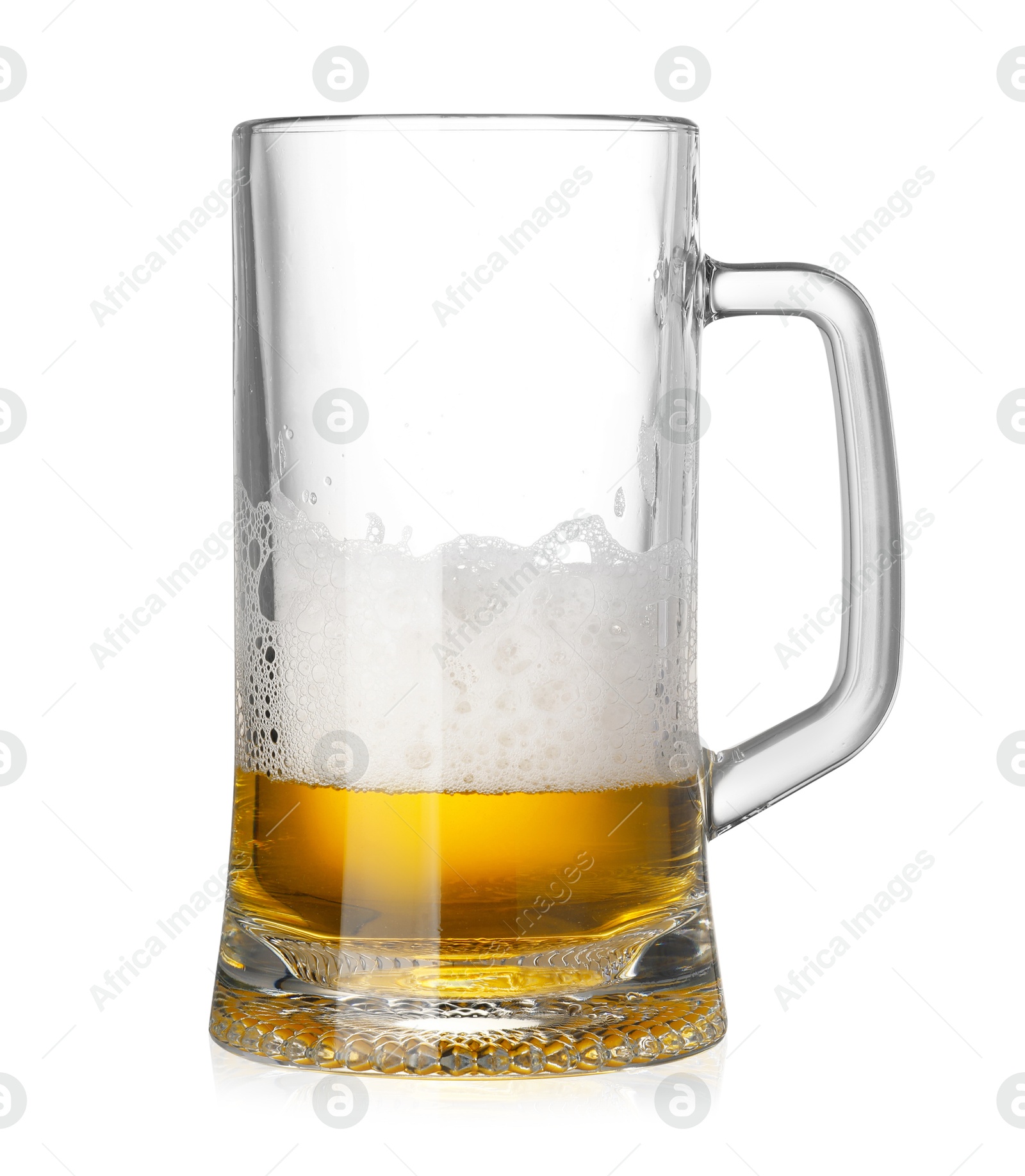 Photo of Almost empty glass mug of beer isolated on white