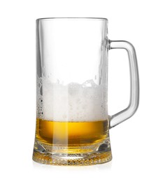 Almost empty glass mug of beer isolated on white