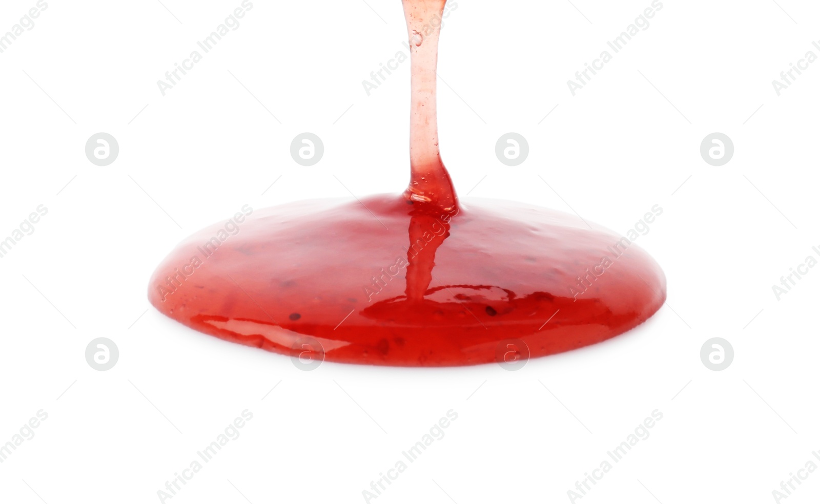 Photo of Pouring delicious strawberry sauce on white background, closeup