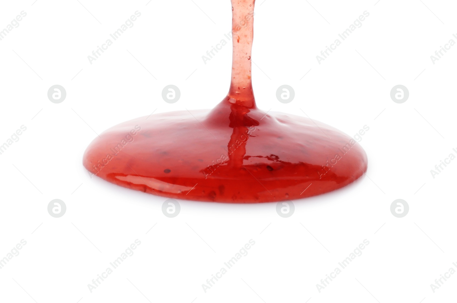 Photo of Pouring delicious strawberry sauce on white background, closeup