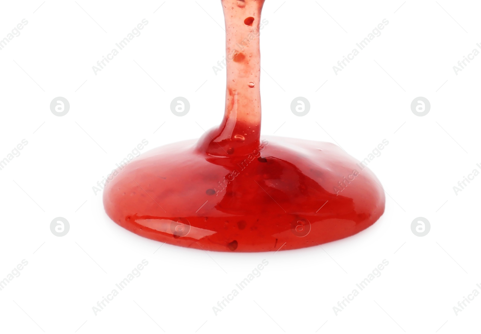 Photo of Pouring delicious strawberry sauce on white background, closeup