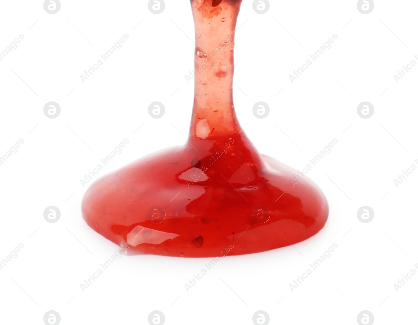 Photo of Pouring delicious strawberry sauce on white background, closeup